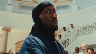 Latif (Mahershala Ali) stares someone down in Your Mother Your Mother Your Mother.