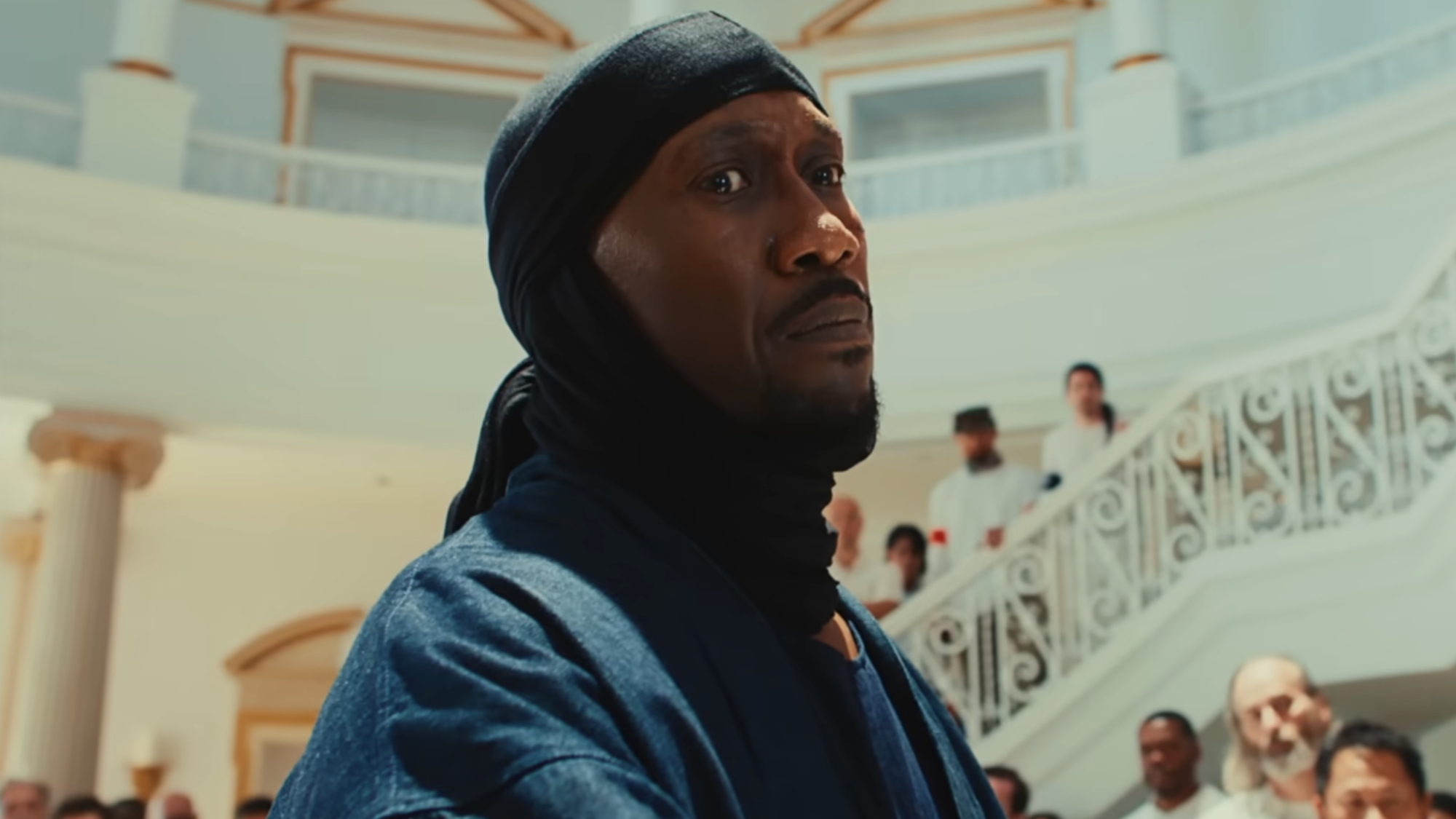 Latif (Mahershala Ali) stares someone down in Your Mother Your Mother Your Mother.