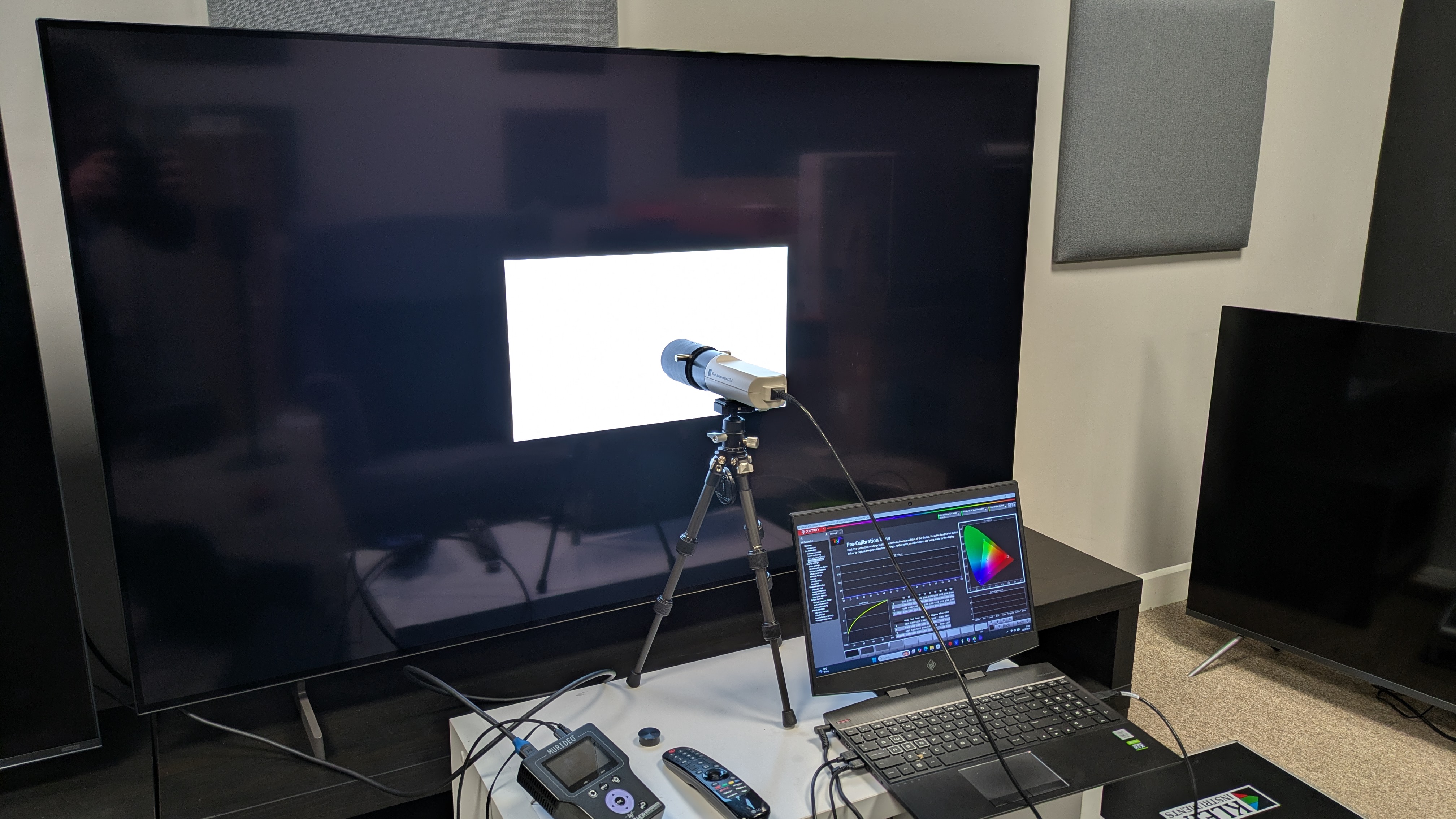 LG B6 OLED TV with testing equipment attached