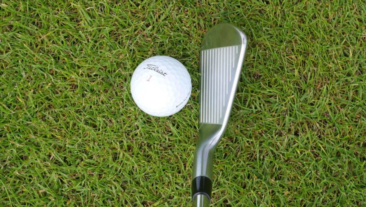 The Titleist T100 iron at address