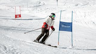 Skier on a race course wearing Helly Hansen Kvitfjell jacket