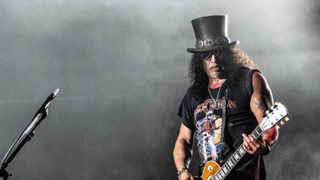 Slash, lead guitarist of the US hard rock band Guns N' Roses, performs on Helviti Stage at the Copenhell heavy metal music festival in Copenhagen, Denmark, on June 17, 2023