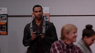 Nathan Mitchell as Zion with a camera in Ginny & Georgia