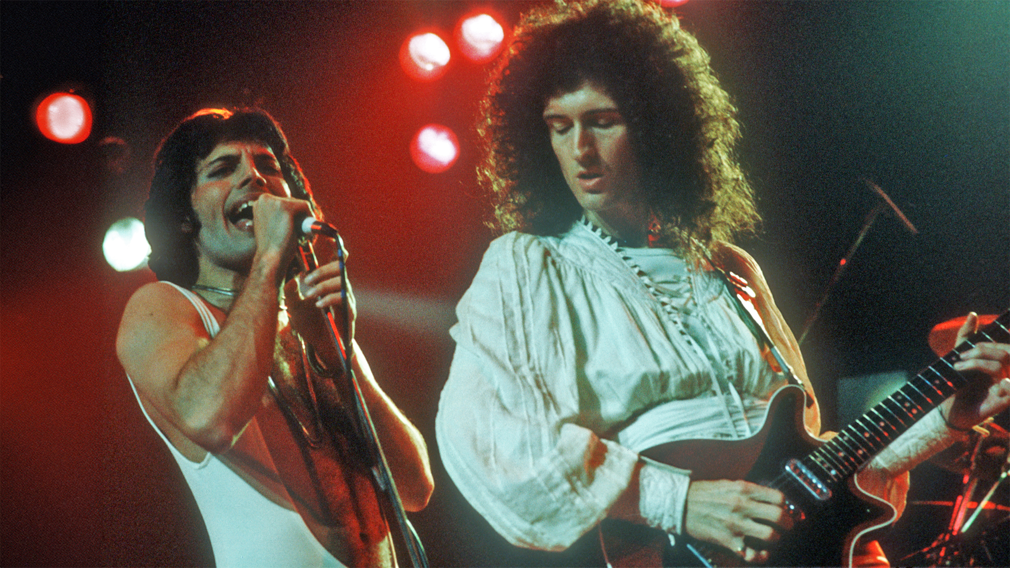 British rock band Queen perform in concert at the Forum on December 22, 1977 in Inglewood, California. 
