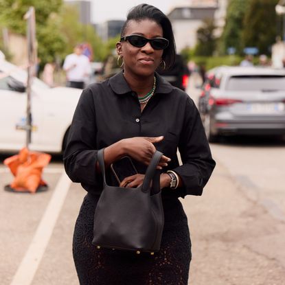 Nikki Ogunnaike wearing black button-down and sheer skirt