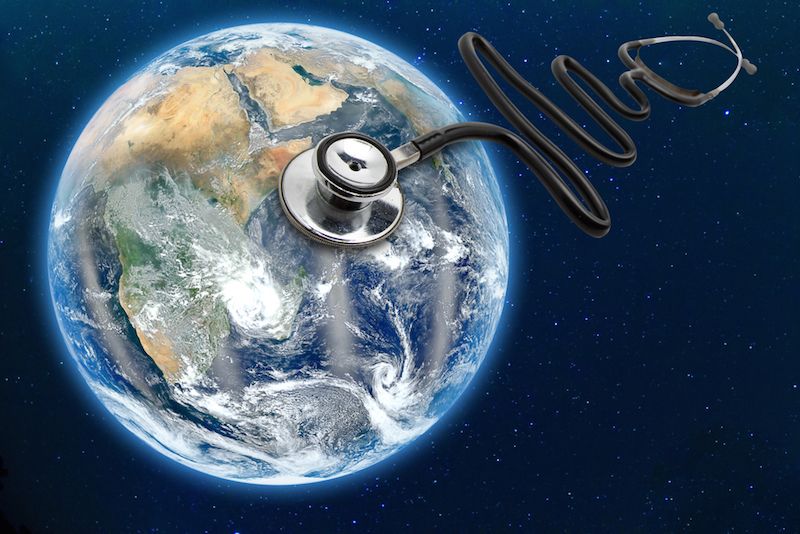 A conceptual image shows a stethoscope over the Earth.