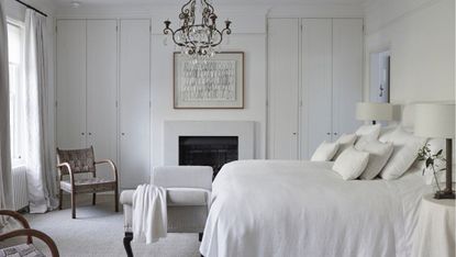 Romantic bedroom ideas – white bedroom with rustic chandelier
