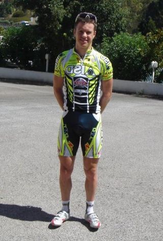 Australia's Simon Clarke shows off his new team kit after signing with ISD for the remainder of 2009.