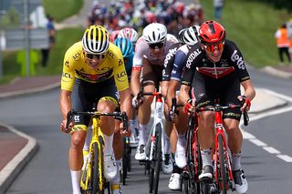 LE CREUSOT FRANCE JULY 02 Mathieu Van Der Poel of The Netherlands and Team AlpecinFenix yellow leader jersey Harry Sweeny of Australia and Team Lotto Soudal during the 108th Tour de France 2021 Stage 7 a 2491km km stage from Vierzon to Le Creusot 369m LeTour TDF2021 on July 02 2021 in Le Creusot France Photo by Chris GraythenGetty Images