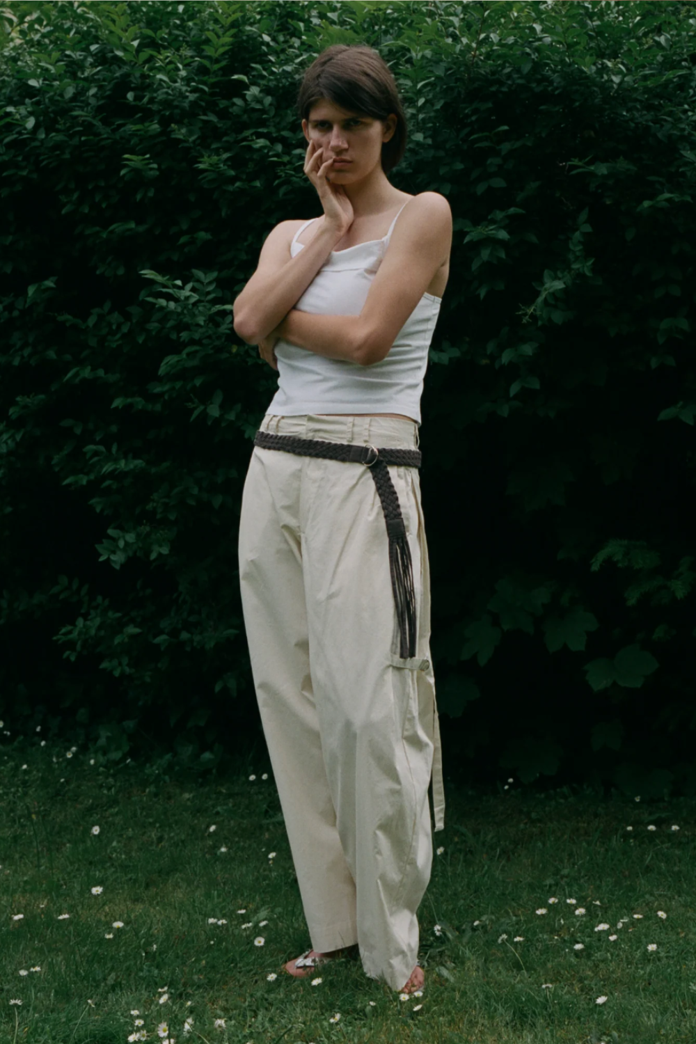 Deiji Studios white vest top cream trousers and belt