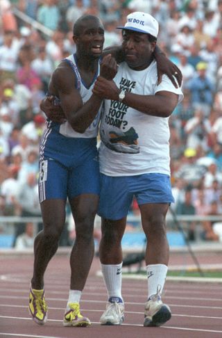 derek redmond and dad on the field