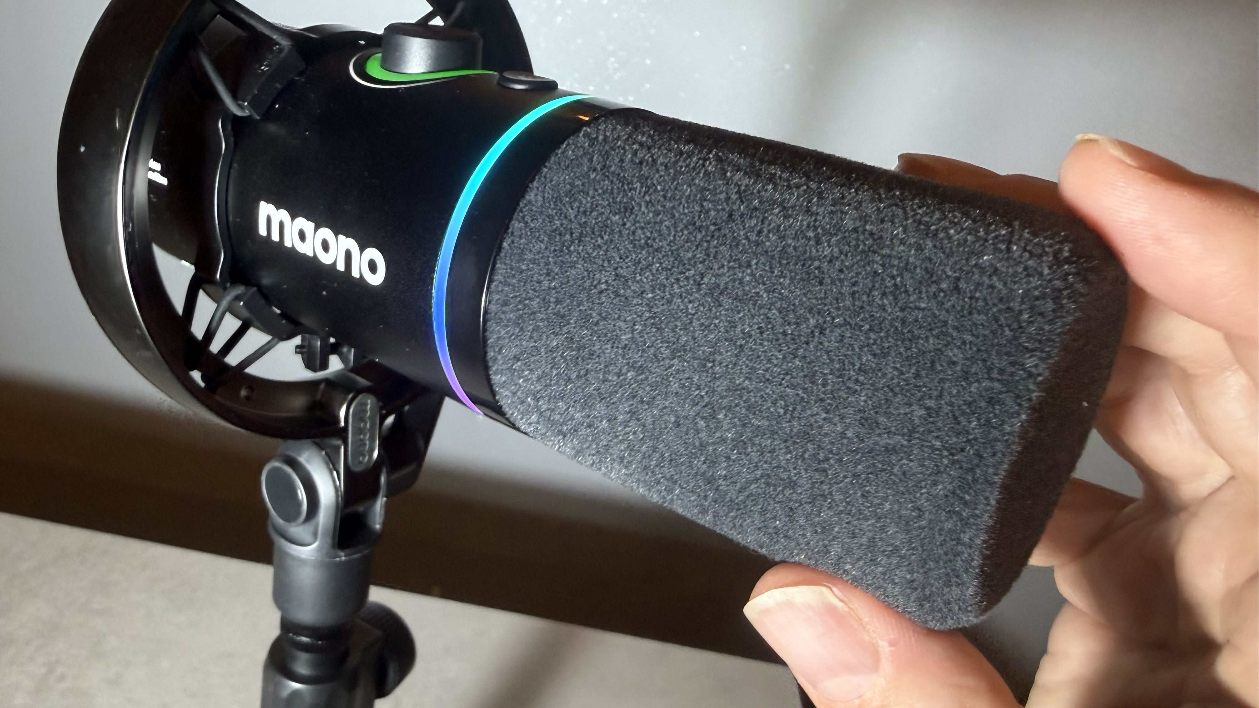 Close-up of the black foam pop shield that protects the mic capsule from &amp;lsquo;popping&amp;rsquo; when you produce plosive sounds