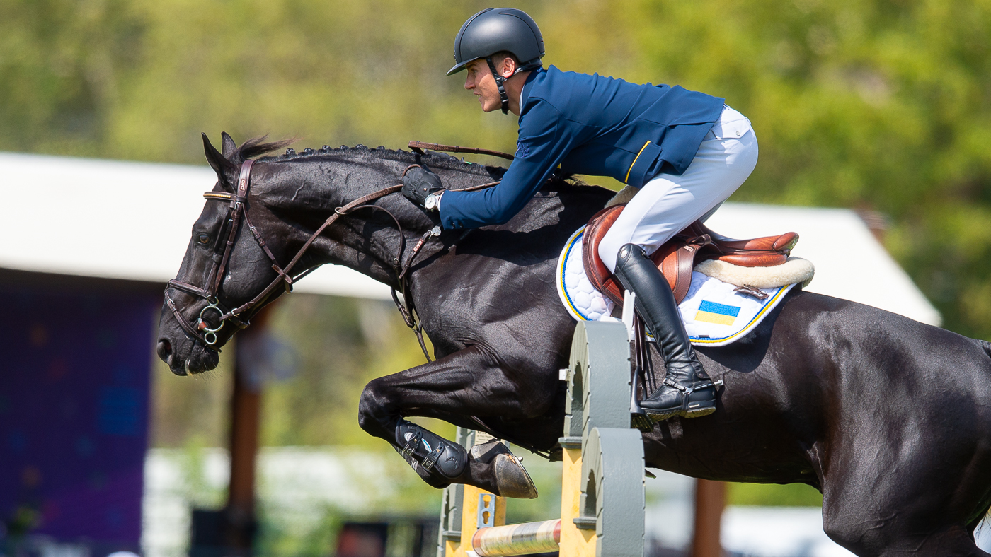 Oleksandr Prodan and Moneymaker Van't Meulenhof in action for Ukraine at the European Showjumping Championships in Milan, Italy