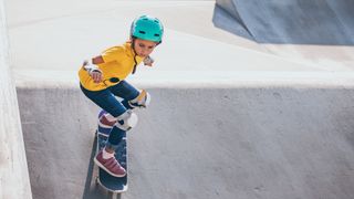 Beginner skateboarder at a skatepark