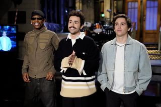 Who is hosting Saturday Night Live tonight, March 30? Pictured: SATURDAY NIGHT LIVE -- Episode 1859 -- Pictured: (l-r) Musical guest Travis Scott, host Ramy Youssef