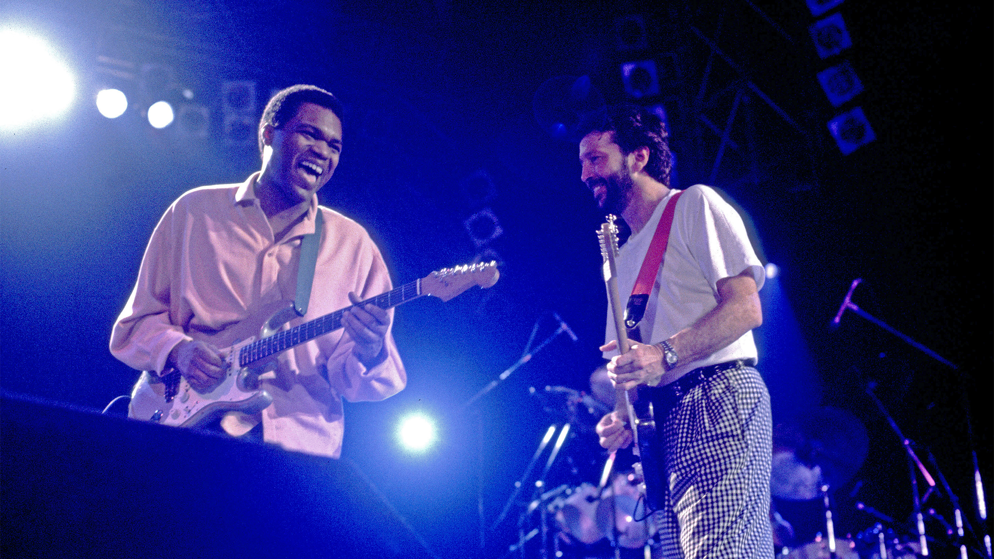 American Blues musician Robert Cray (left) and British musician Eric Clapton perform together on stage, Chicago, Illinois, April 19, 1987.