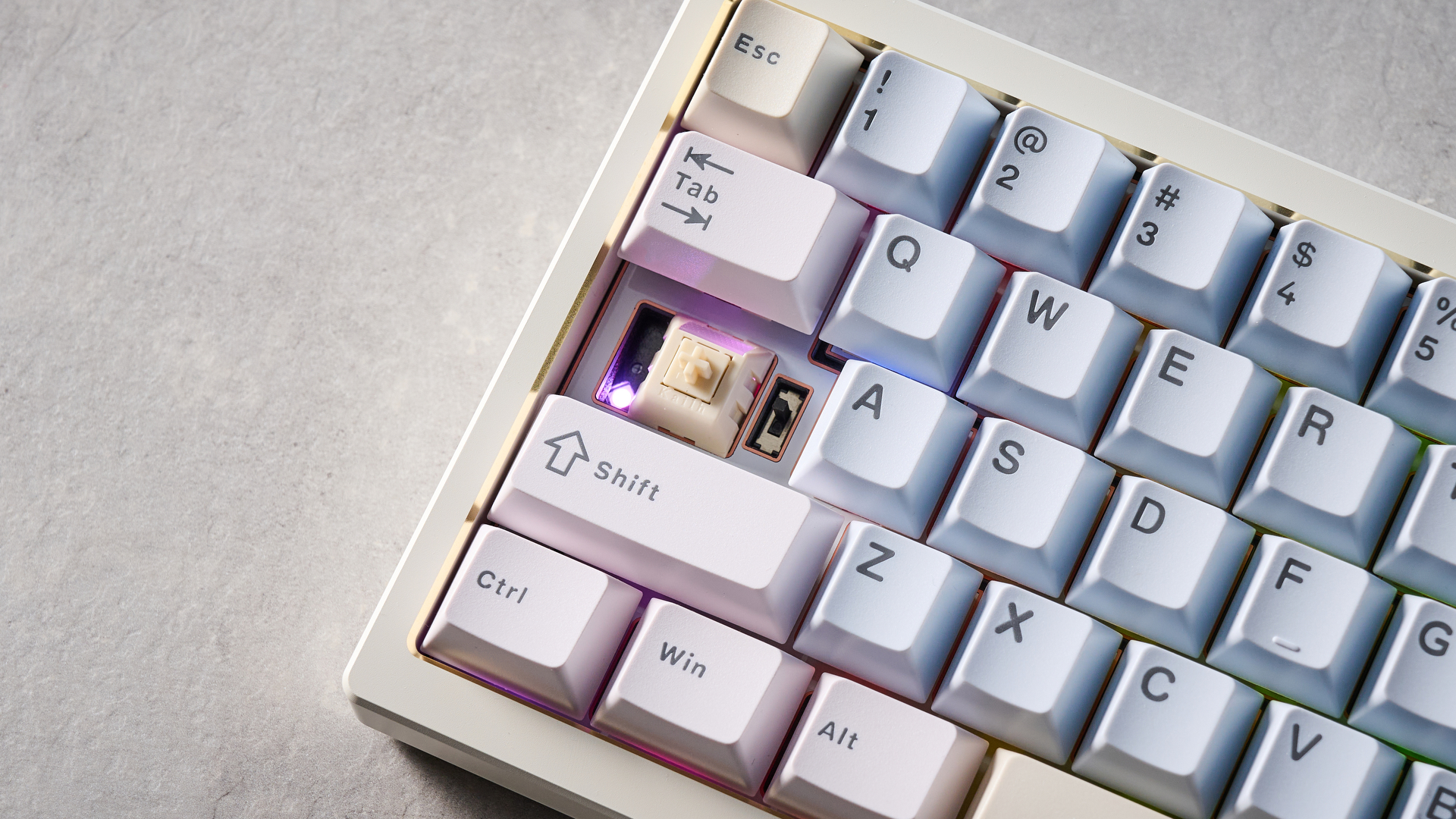 Wobkey Zen 65 mechanical keyboard photographed in front of a blue background