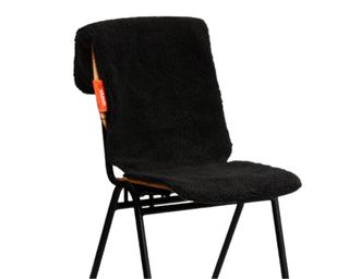 Electric heated throw pad on seat in black cut out