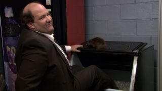 Kevin putting his feet in the ice machine in The Office