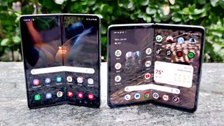 Samsung Galaxy Z Fold 4 and Google Pixel Fold thickness laying flat on a tablet