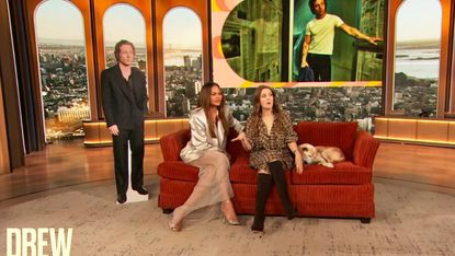 Drew Barrymore and Chrissy Teigen on the Jeremy Allen White Calvin Klein Couch