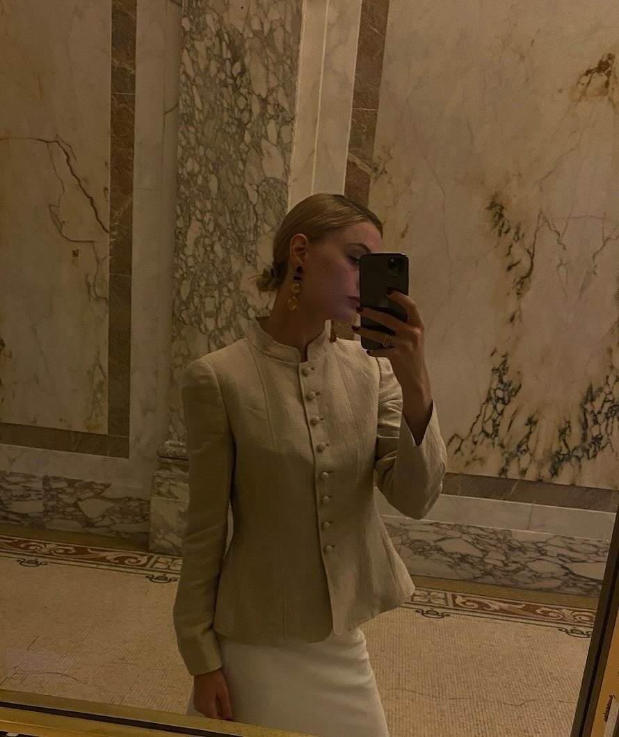 Woman wearing peplum top as a spring 2026 trend.