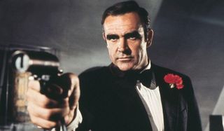 Sean Connery aiming his gun, in a tuxedo, in Diamonds Are Forever