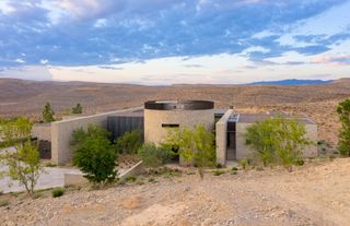 Fort 137 in Las Vegas valley by Daniel Joseph Chenin exterior from higher ground