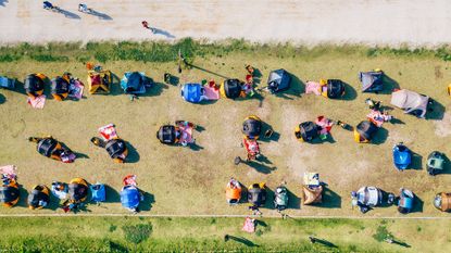 Aerial view of people in a city park on a spring day