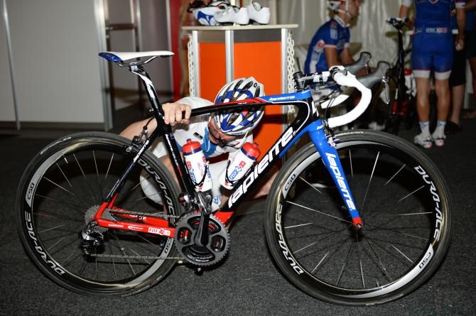 Jussi Veikkanen checks his bike