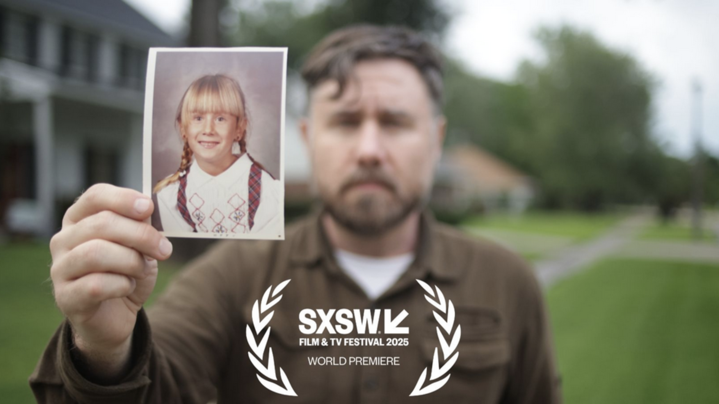 Jim holds up a photo of himself in his former, female life as "Kristi" in documentary The Secret of Me 