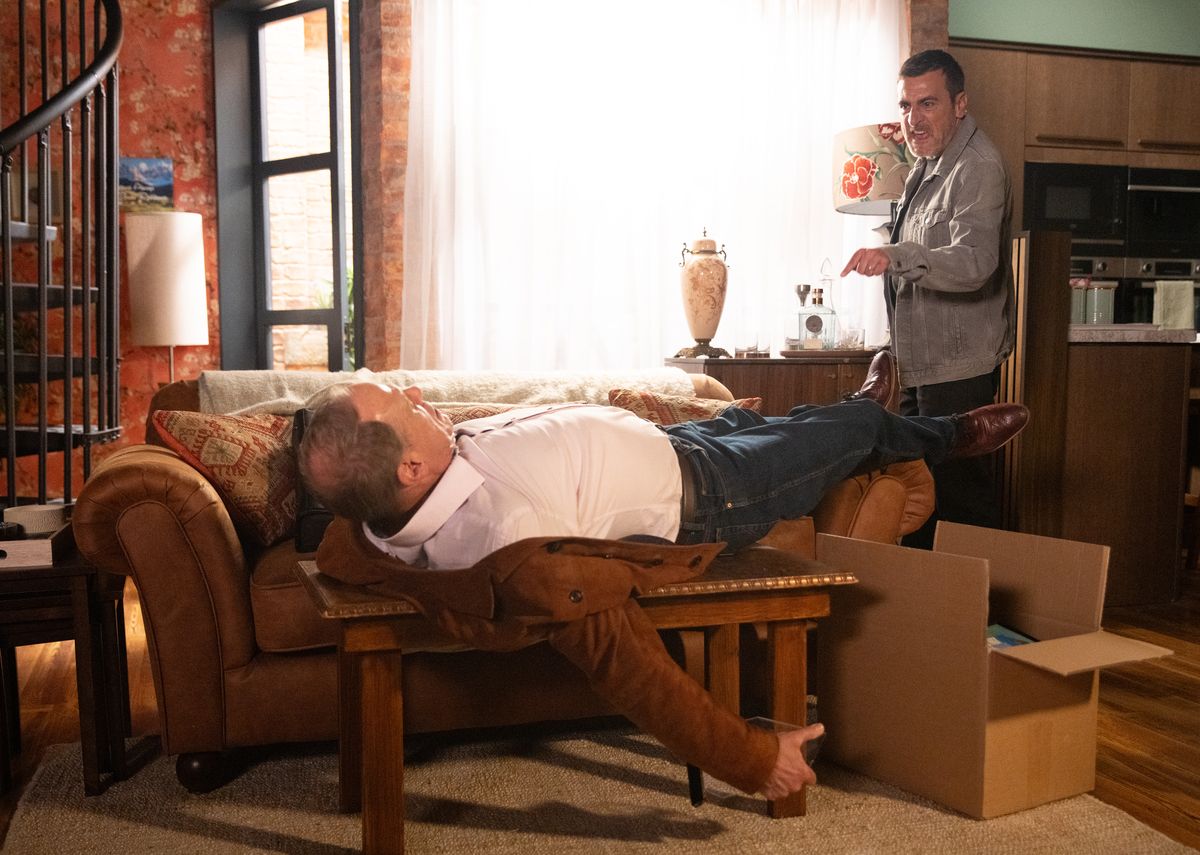 Peter Barlow furiously confronts Stephen Reid as he lies on the table.