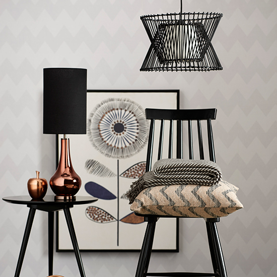 room with black wall and chair