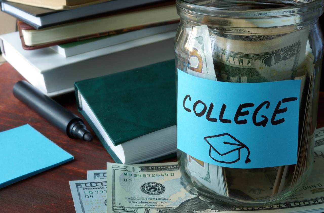 Jar with label college and money.