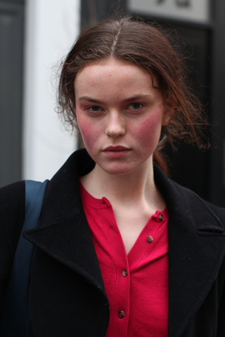 Woman at LFW wearing bright blush