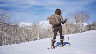 A woman snowshoes near Park City Utah