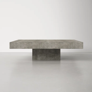 Angular pedestal coffee table.
