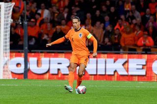 Virgil van Dijk of the Netherlands controls the ball during the friendly match between Netherlands and Scotland at Johan Cruijff ArenA on March 22, 2024 in Amsterdam, Netherlands. (Photo by Marcel ter Bals/DeFodi Images via Getty Images)