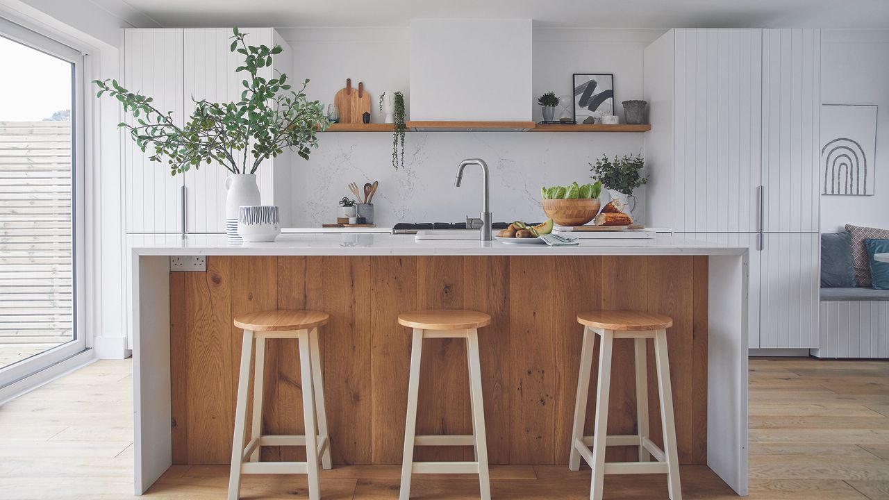 White open plan kitchen with island