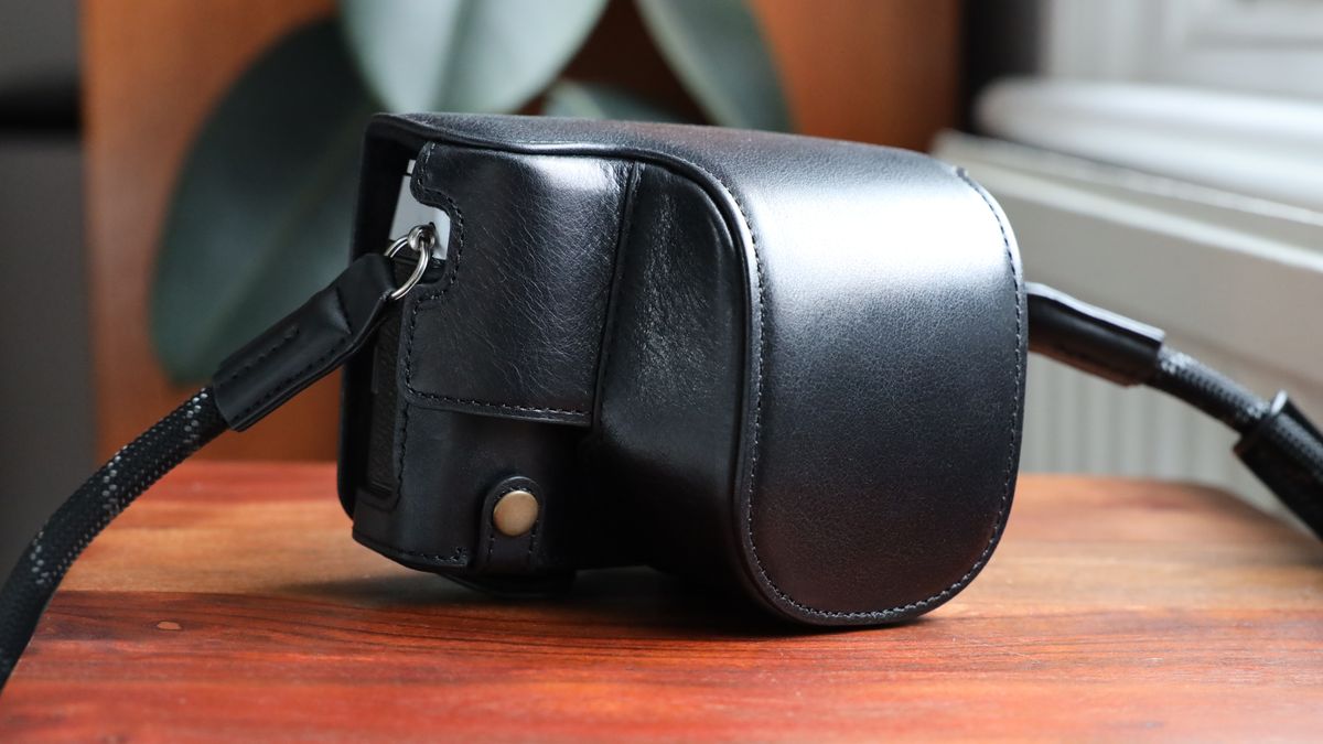 Fujifilm X100VI camera on a wooden table