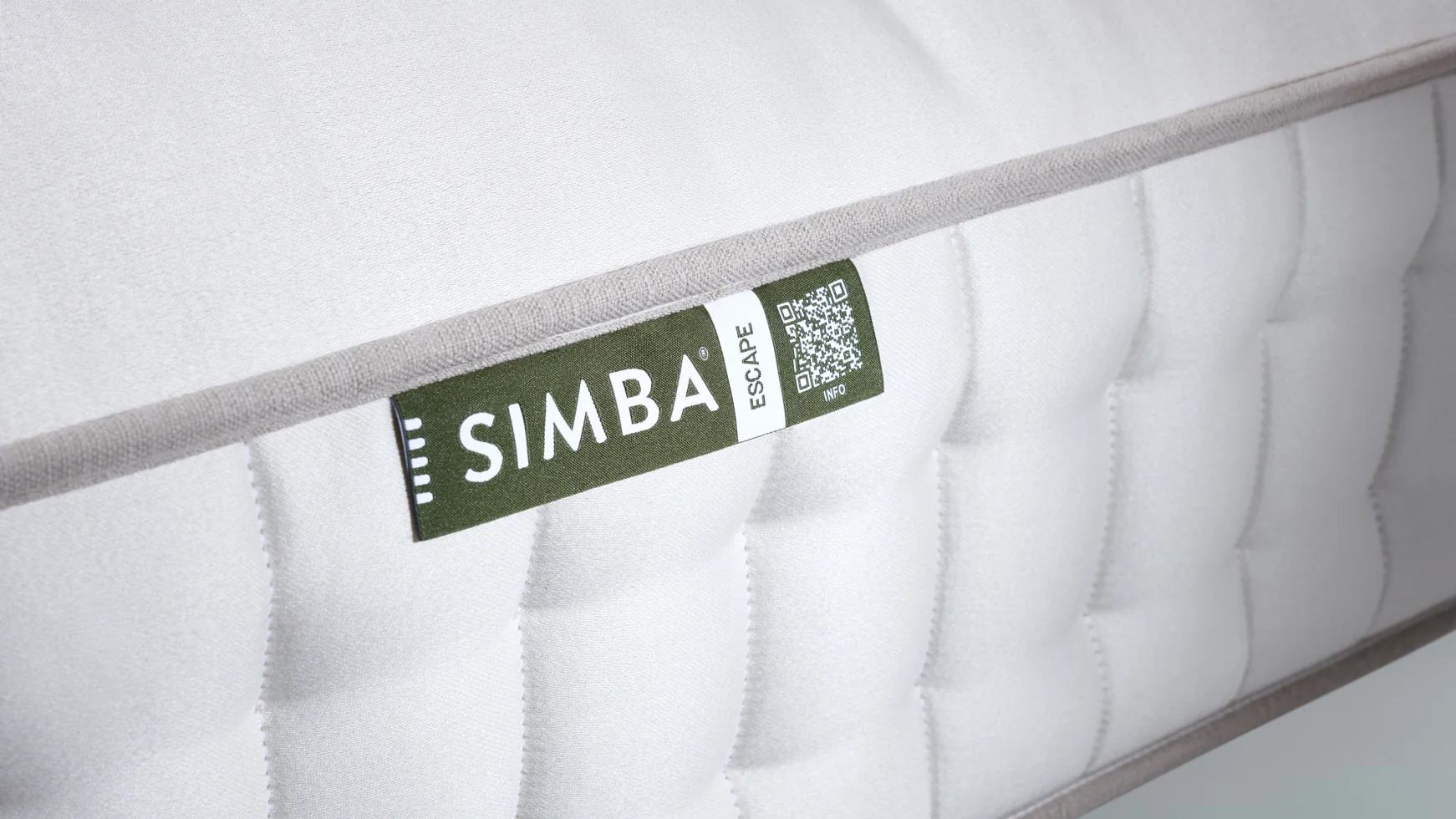 The corner of the Simba Earth Escape Mattress showing the Simba label