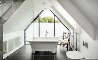 bathroom with vaulted ceiling
