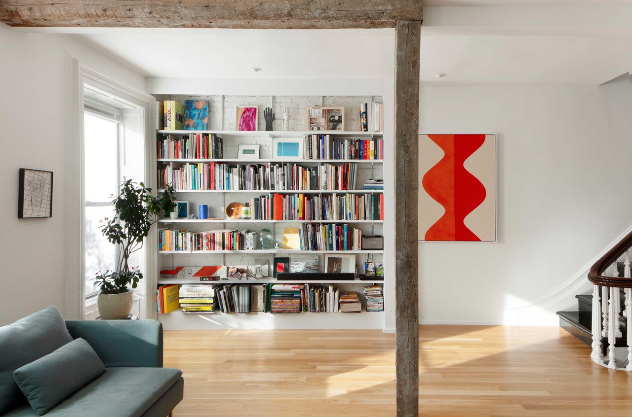 a living room with books