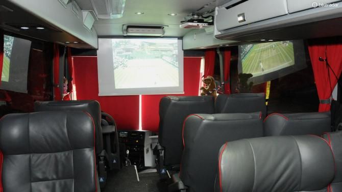 When stationary, a projector and screen can be used to show almost any TV shows or films - or the tennis from Wimbledon