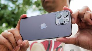 Closeup of Apple iPhone 14 Pro Max cameras.