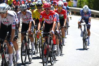 OUREM PORTUGAL AUGUST 18 Brandon McNulty of The United State and UAE Team Emirates Red Leader Jersey competes during the 79th La Vuelta Ciclista a Espana 2024 Stage 2 a 194km stage from Cascais to Ourem UCIWT on August 18 2024 in Ourem Portugal Photo by Tim de WaeleGetty Images