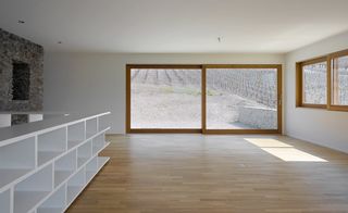 The window’s angled walls create an interesting light and shadow play inside