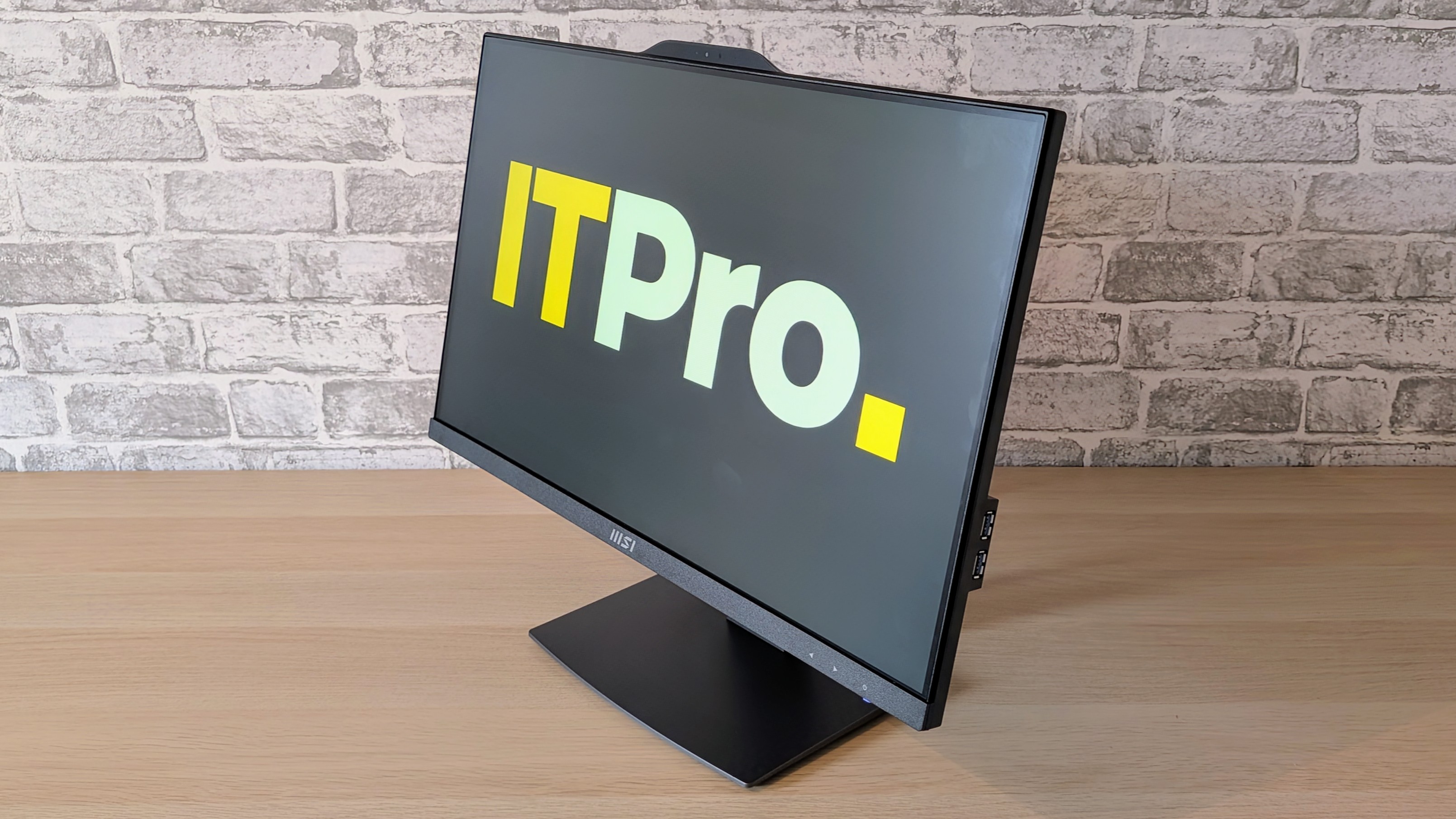 The MSI Pro AP242P 14M on a desk