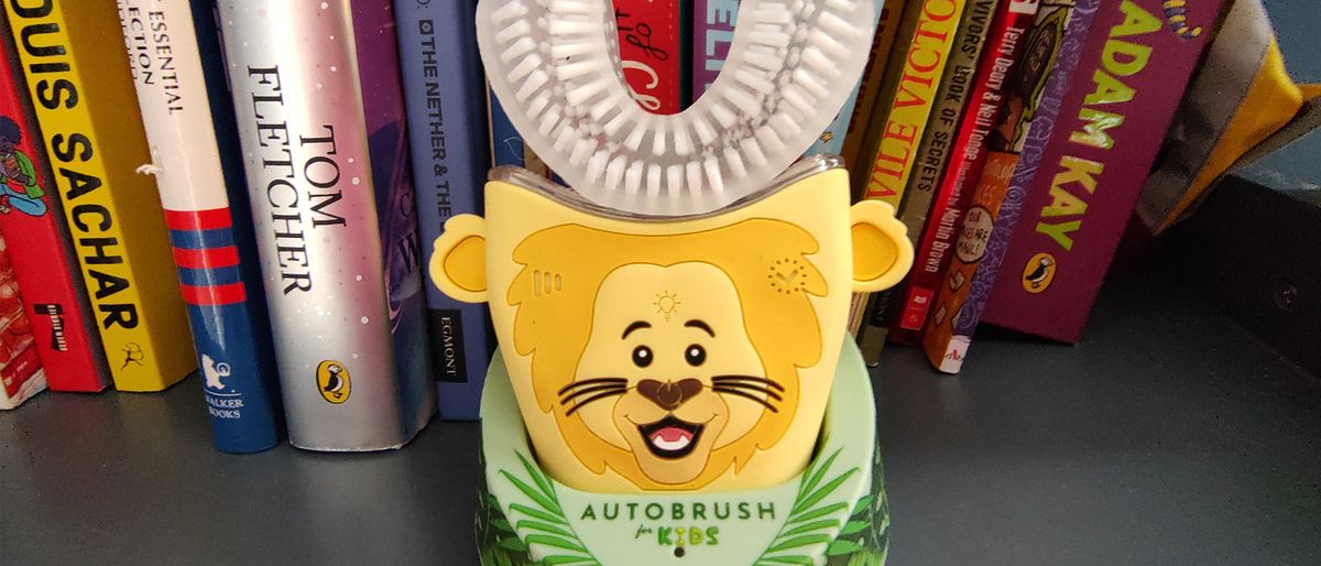 Photo of the AutoBrush Sonic Pro for Kids on a child&#039;s bookshelf