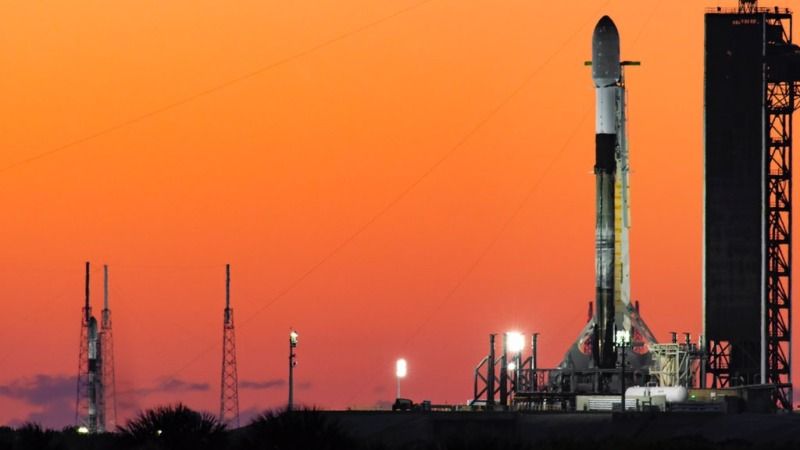 A SpaceX Falcon 9 rocket carrying a new batch of Starlink internet satellites is seen atop Pad 39A of NASA&#039;s Kennedy Space Center (right) in this photo taken Jan. 31. At left, another Falcon 9 that launched an Italian satellite from Cape Canaveral Space Force Station on Jan. 31 is visible.